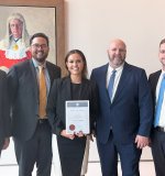 Claire Wilson with her colleagues (left to right) Peter McCartney, Christopher Lee, Scott Thornton and Hamish Burke. Photos: Supplied